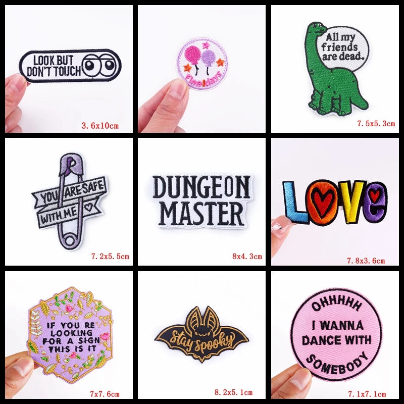 Collection of various stickers with different designs and text, held by hands for size reference.