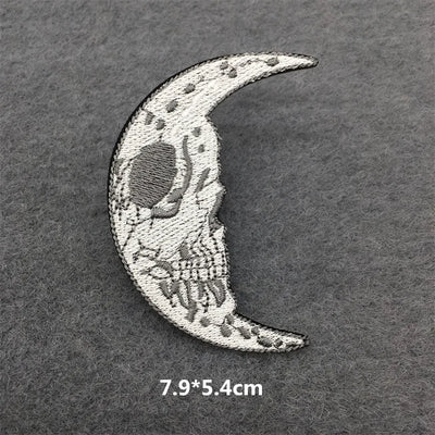 Embroidered crescent moon patch on a textured gray background with dimensions displayed.