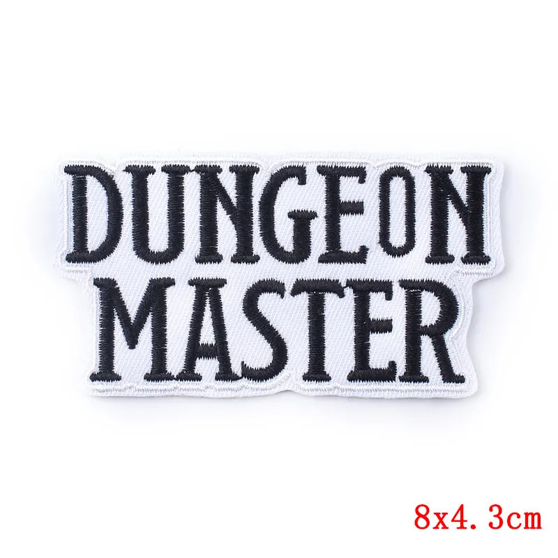 Embroidered patch with 'Dungeon Master' text on a white background
