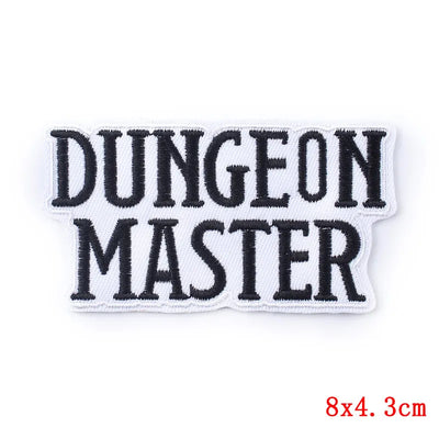 Embroidered patch with 'Dungeon Master' text on a white background