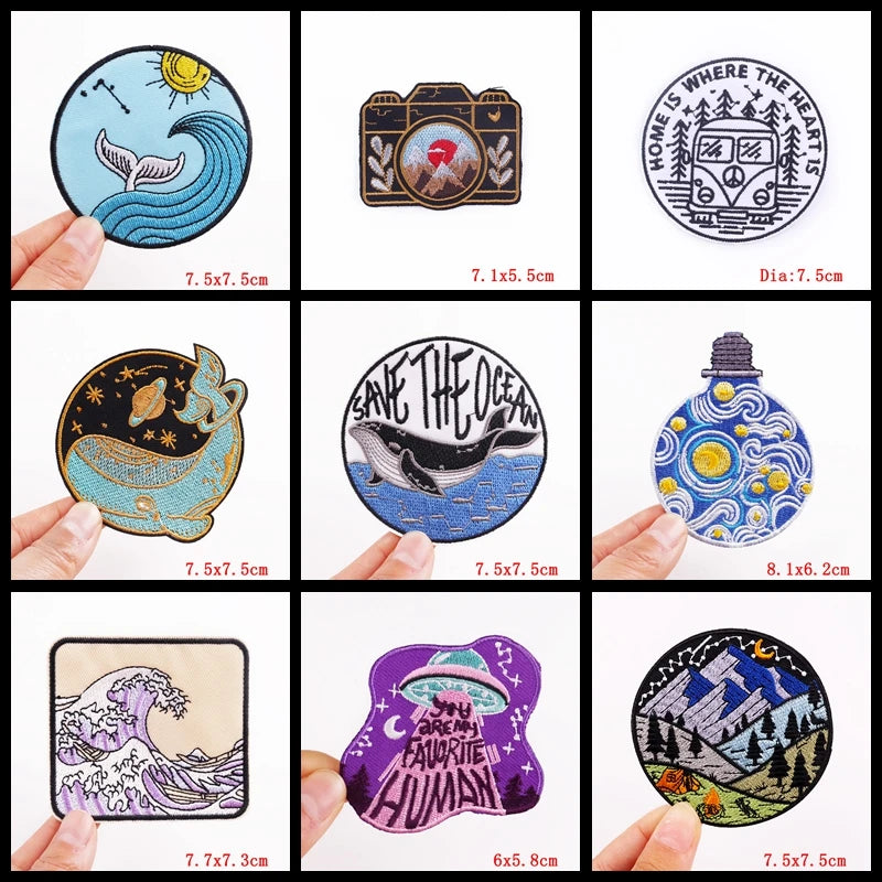Collection of various stickers with different designs held by hands, displayed against a white background.