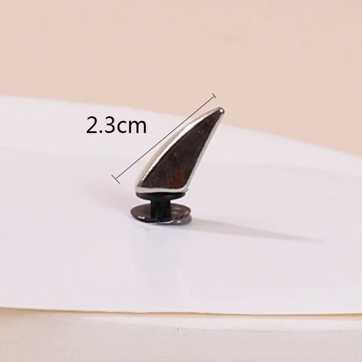 Metal clip with measurement label on a white background