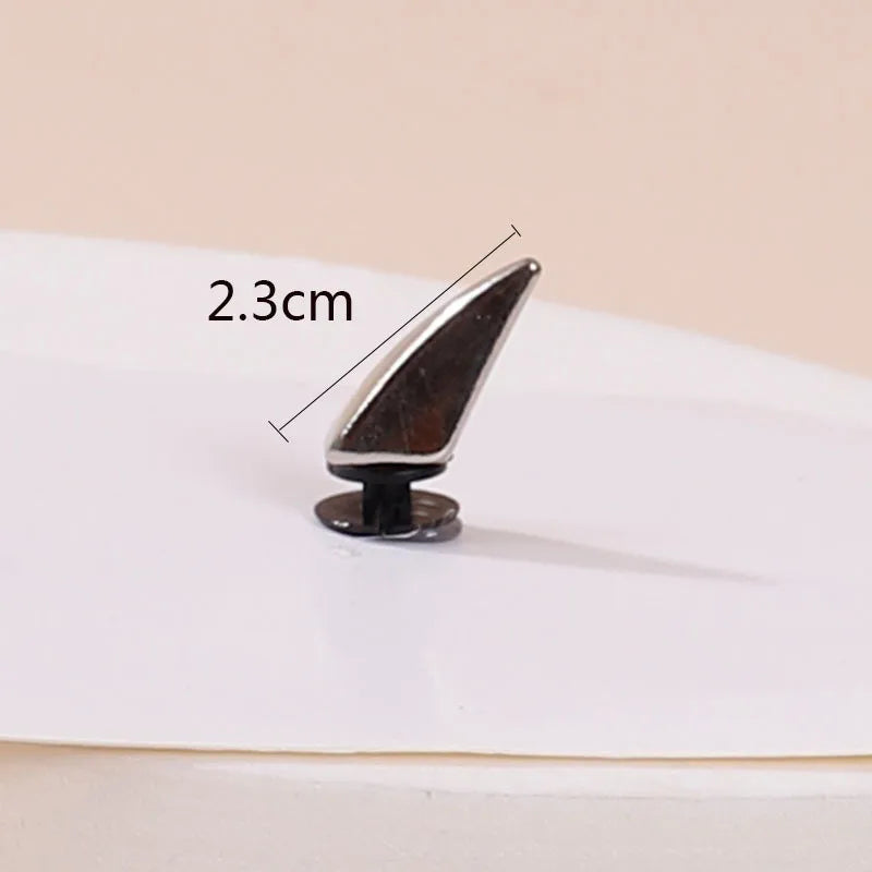 Metal clip with measurement label on a white background