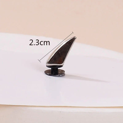 Metal clip with measurement label on a white background