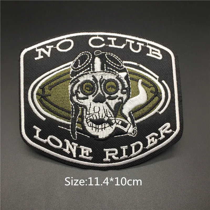 Embroidered patch with skull design and 'No Club Lone Rider' text on a dark background