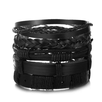 Stack of black braided bracelets on a white background