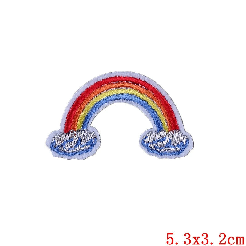 a classic rainbow cloud embroidered iron-on patch approximately 5.3x3.2cm on a light gray background