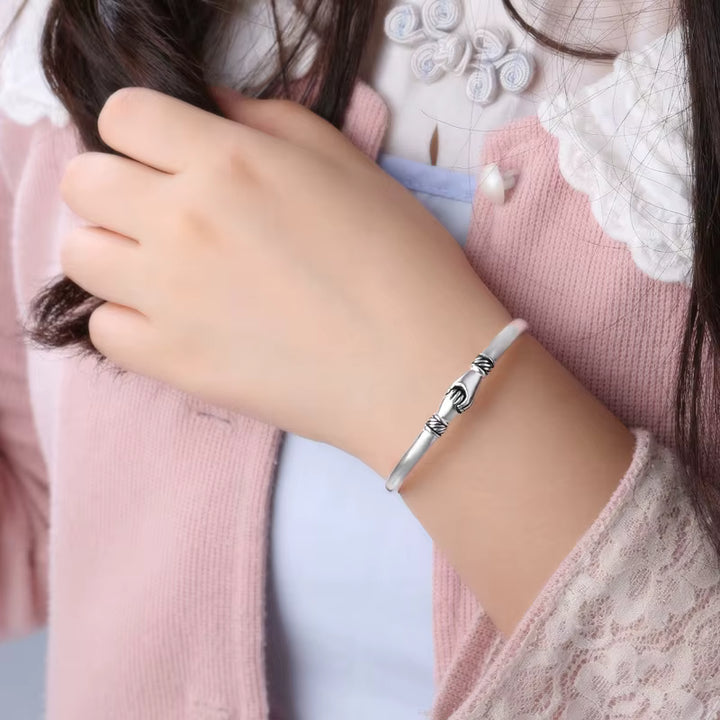Silver bracelet on a child&