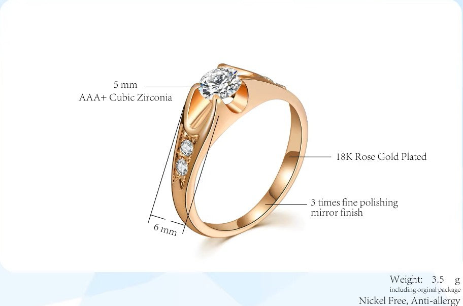 Rose gold-plated ring with cubic zirconia stones on a white background