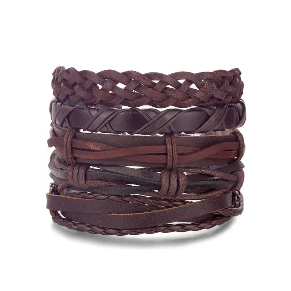 Stack of braided leather bracelets on a white background