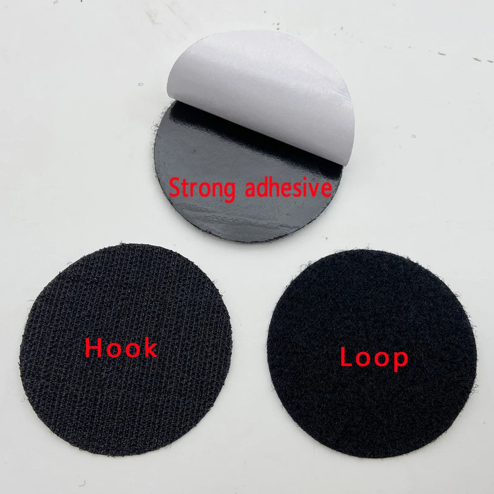 Hook and loop fastener components with adhesive on a white background