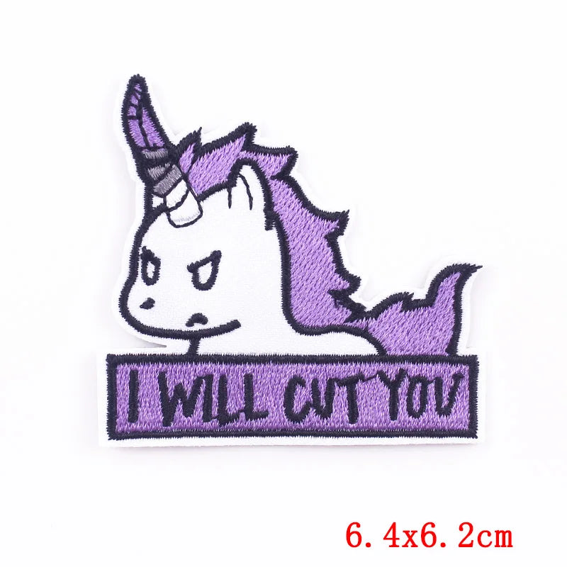 Embroidered patch with a unicorn design and text 'I WILL CUT YOU' on a white background.