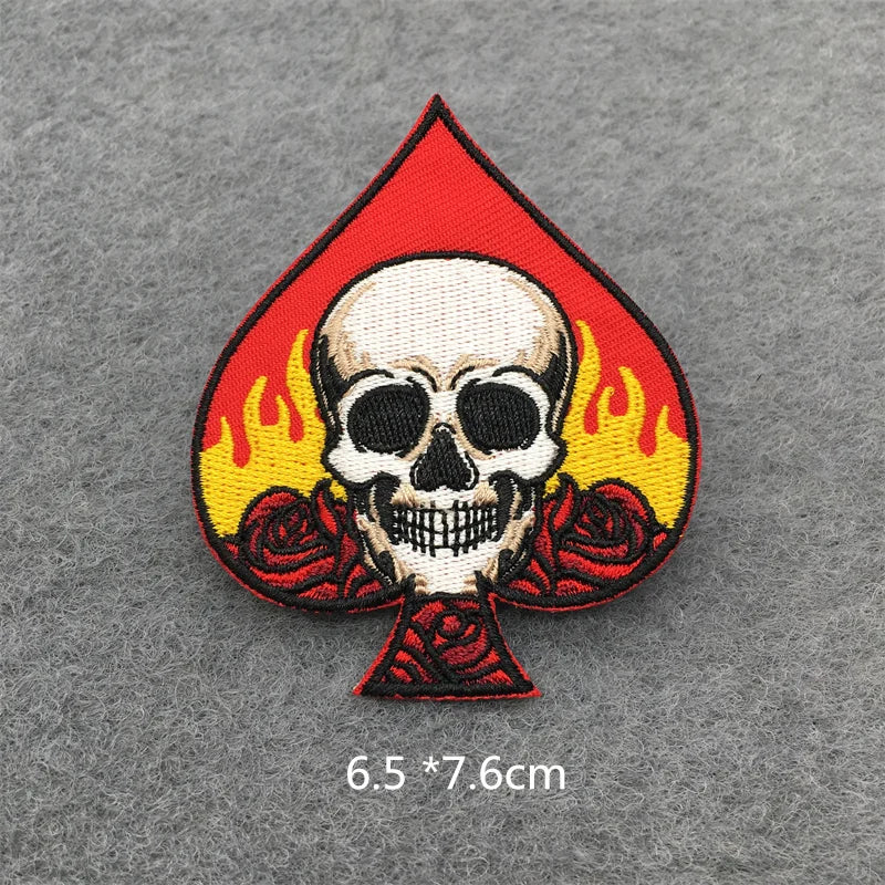 Skull and roses design patch on a gray background with size measurement.