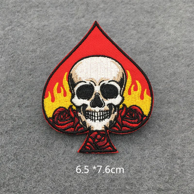 Skull and roses design patch on a gray background with size measurement.