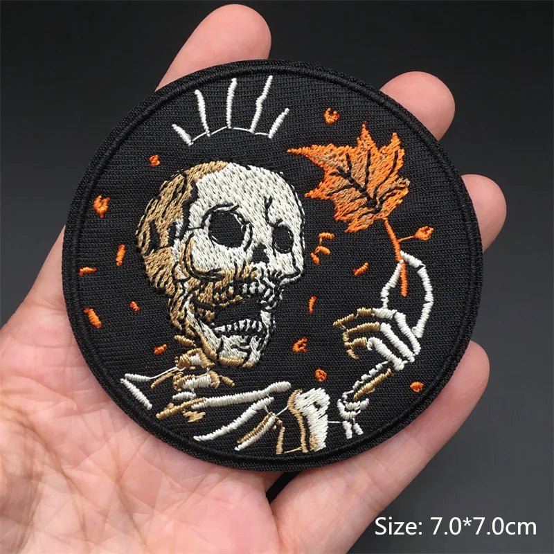 Embroidered patch with skeleton design held in a hand, size 7.0*7.0cm