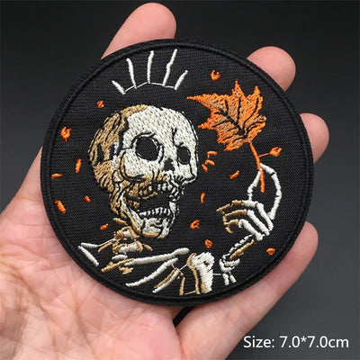 Embroidered patch with skeleton design held in a hand, size 7.0*7.0cm