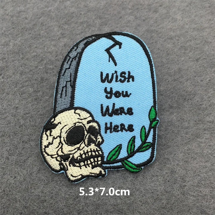 Embroidered patch with skull and &