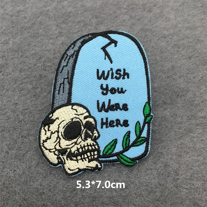 Embroidered patch with skull and 'Wish You Were Here' text on a gray background