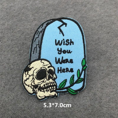 Embroidered patch with skull and 'Wish You Were Here' text on a gray background