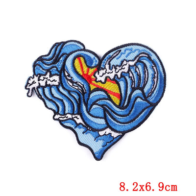 Heart-shaped wave design patch with colorful center on a white background