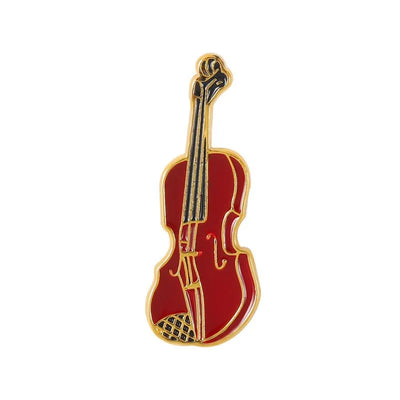 Red violin-shaped pin with gold accents on a white background