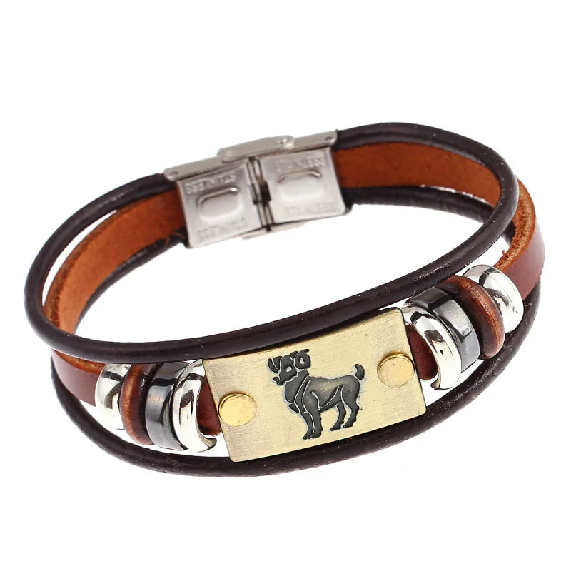 Brown leather bracelet with metal accents and a dog emblem on a white background