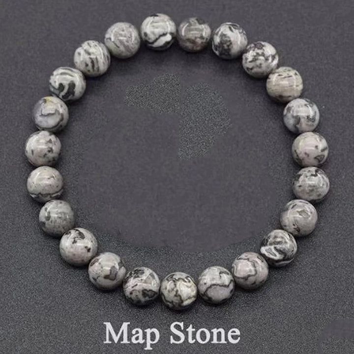 Map stone beaded bracelet on a dark background