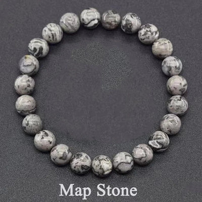 Map stone beaded bracelet on a dark background