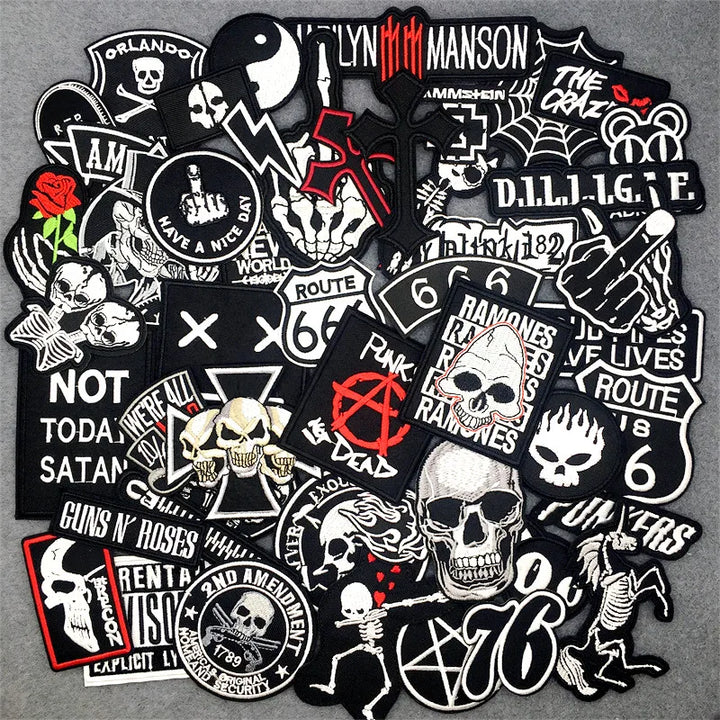 Collection of various stickers with graphic designs and text on a gray background