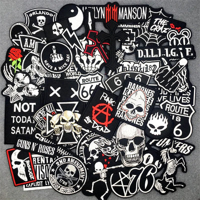 Collection of various stickers with graphic designs and text on a gray background