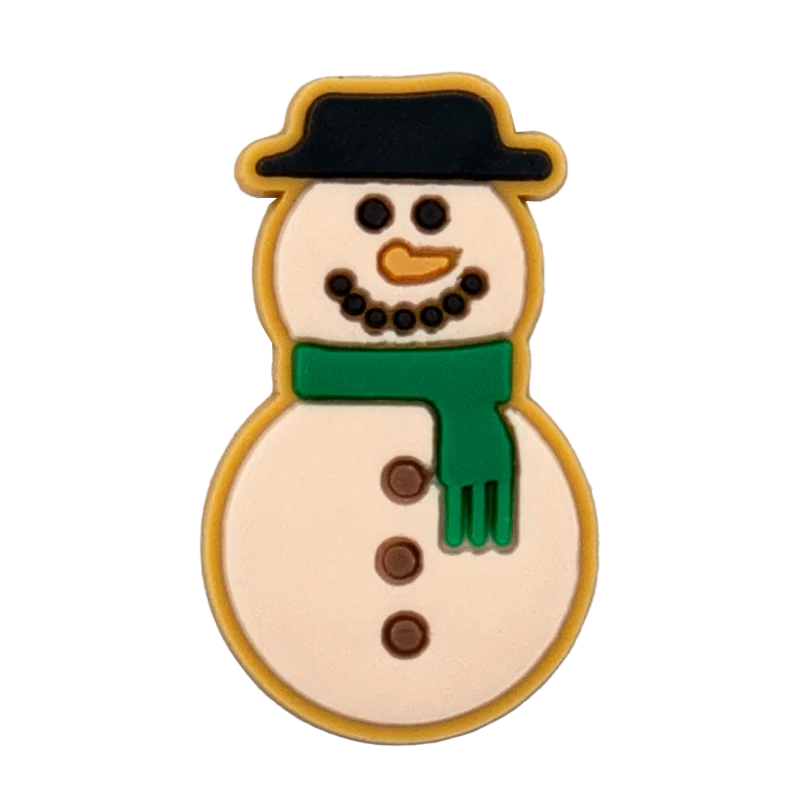 Wooden snowman shoe charm ornament with a green scarf on a white background