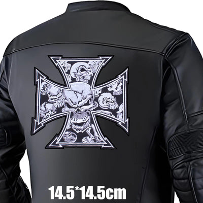Black leather jacket with a large iron cross design on the back, featuring skulls and roses.