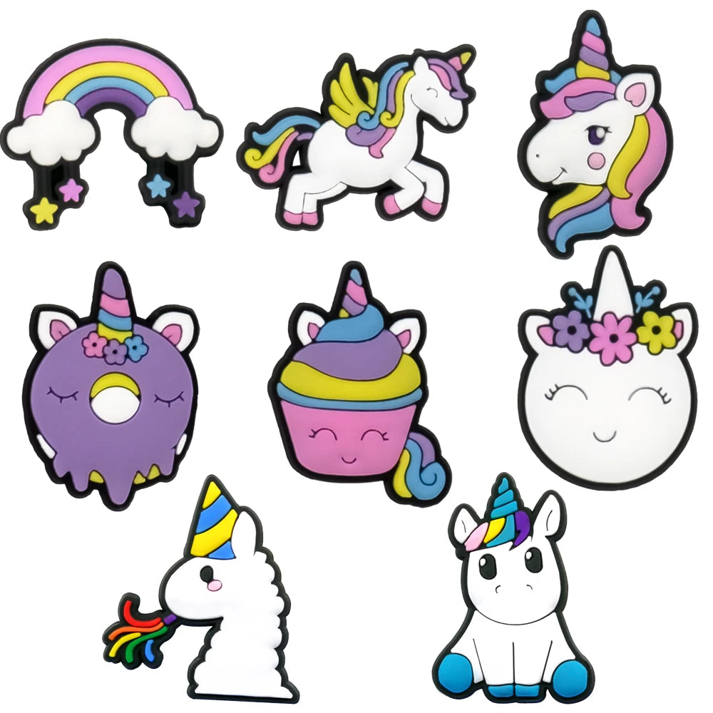 Set of colorful unicorn-themed shoe charms on a white background