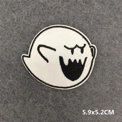 Ghost-shaped patch with a sad expression on a gray background