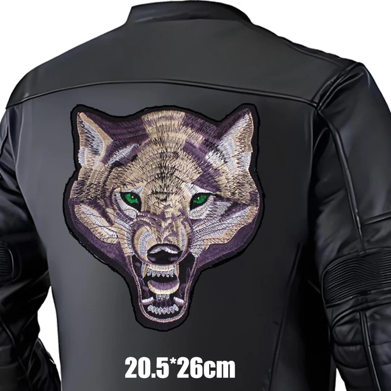 Black jacket with a large embroidered wolf patch on the back, size indicated.