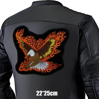 Black leather jacket with an eagle and flames design on the back, size 22x25cm.