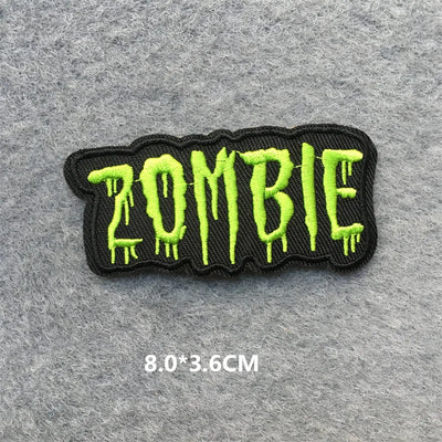 Embroidered patch with 'ZOMBIE' text on a gray background