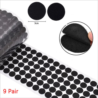 Black adhesive Velcro dots with packaging and close-up on a white background
