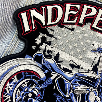 Embroidered patch with motorcycle design and 'INDEPENDENT' text on a flag background