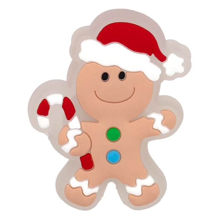 Gingerbread man cookie cutter with a red hat on a white background