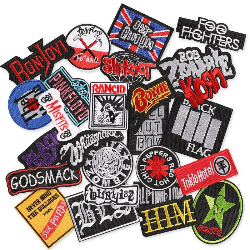 Collection of 26 music band patches on a white background