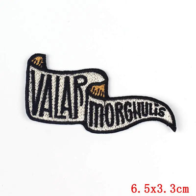 Pipe-shaped patch with 'Valar Morghulis' text on a white background