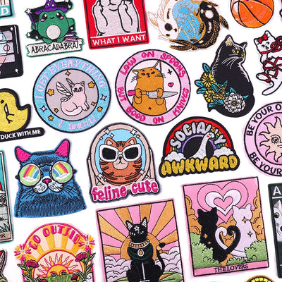 Collection of colorful patches with various designs on a white background