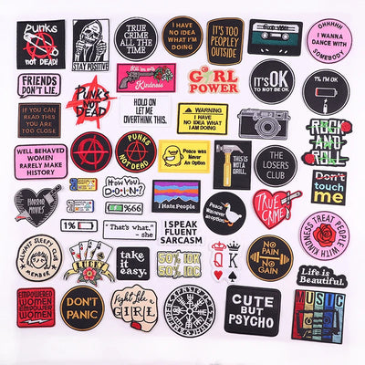 Collection of various stickers with different designs and text on a white background