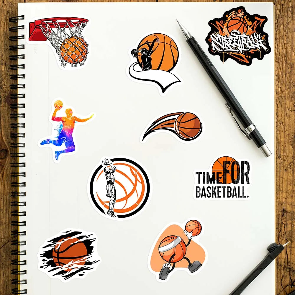 Basketball-themed stickers on a notebook with a pen