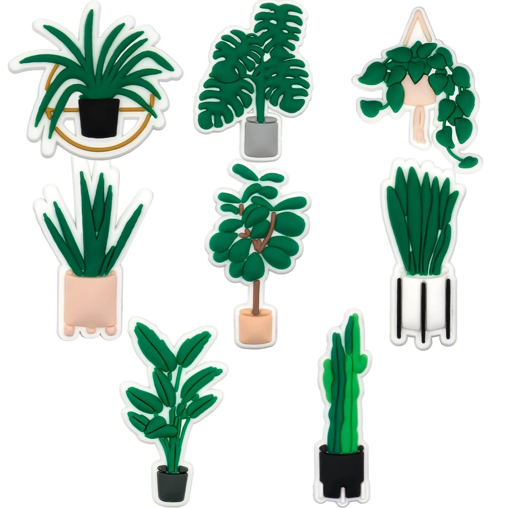 Set of green potted plants shoe charms on a white background