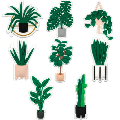 Set of green potted plants shoe charms on a white background