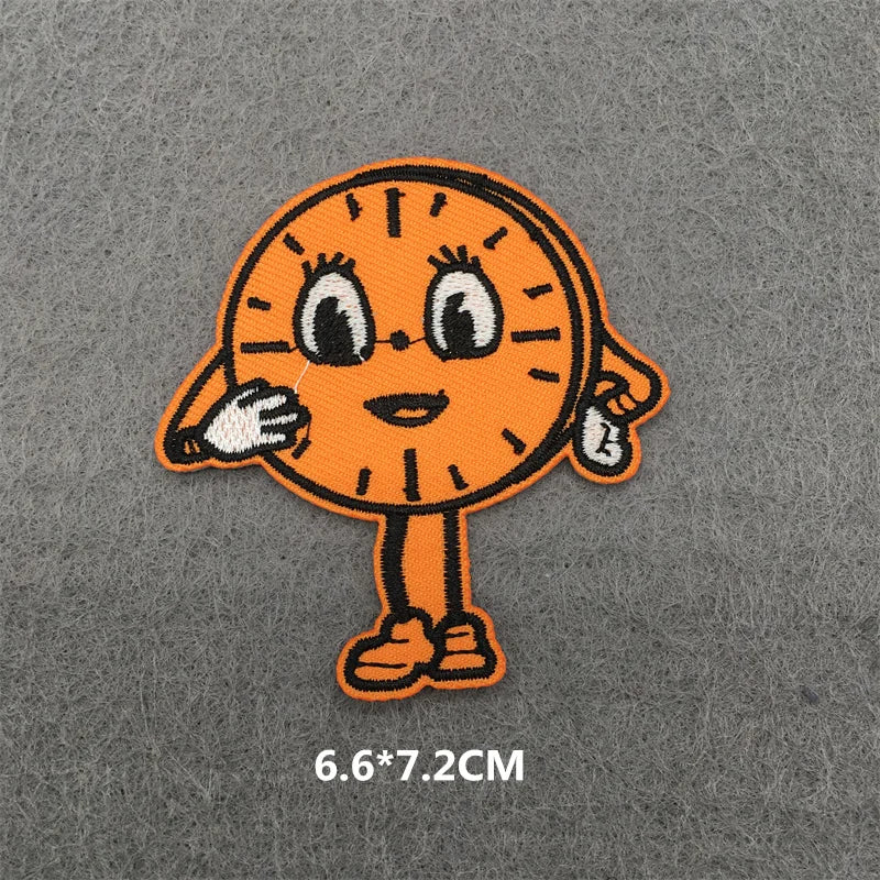 Orange cartoon character patch on a gray background