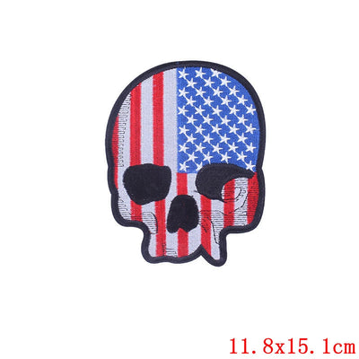 Skull-shaped patch with American flag design on a white background, branded 'Prajna'.