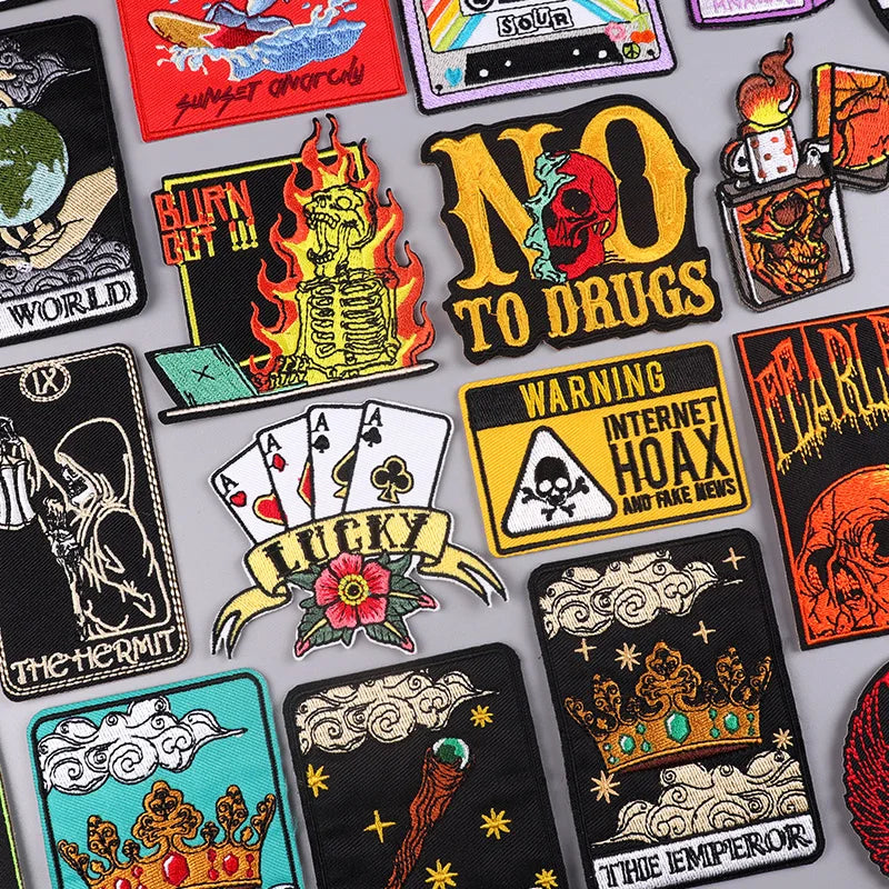 Collection of various colorful patches with different designs on a gray background